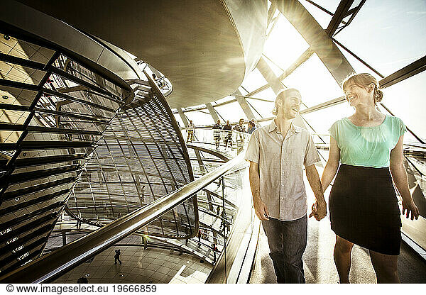 Young couple at the Reichstag Dome in Berlin  Germany