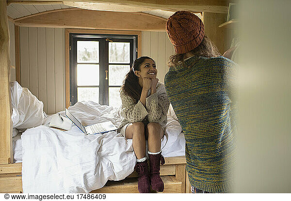 Young couple in tiny cabin rental
