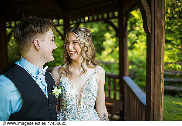 Young couple smiling  looking into each others eyes