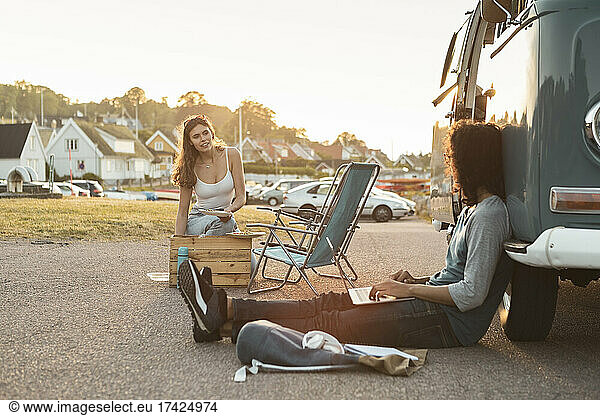 Young couple spending leisure time during vacation in evening