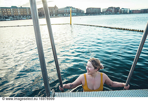 Young Danish Woman Walking Into Cold Water