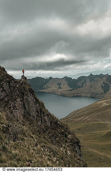Young explorer climbing a mountain in the north of Ecuador