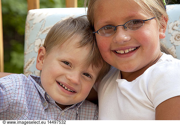 Young Girl and Boy Smiling
