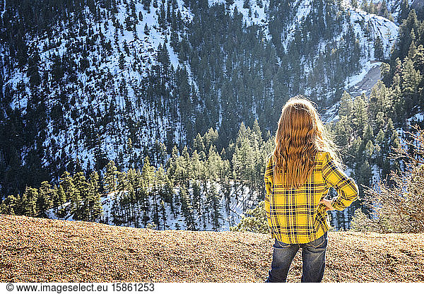 Young Girl Hiking in the Mountains