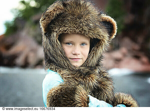 Young Girl in Spirit Hood Outdoors