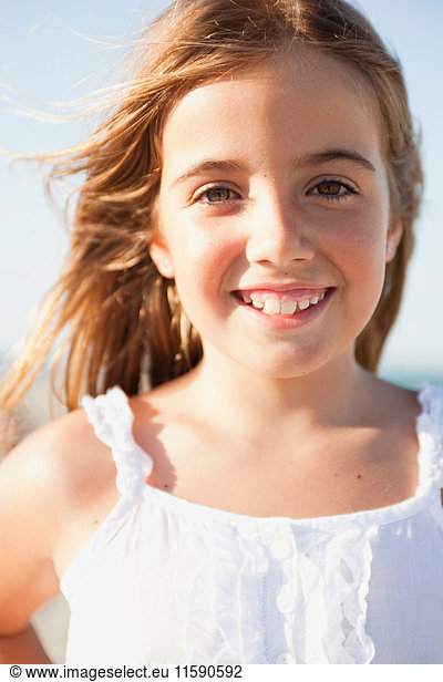 young girl smiling at viewer