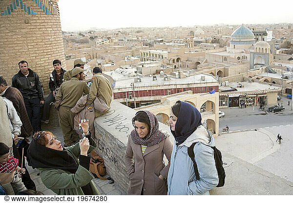 Young Iranian girls pose for tourist pictures in Yazd  Iran