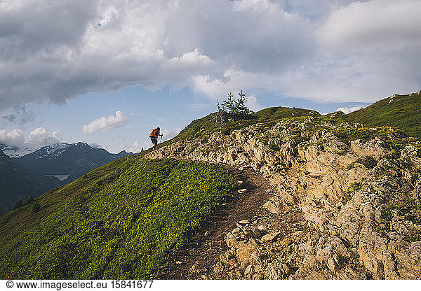 Young male hiking in the French Alps  Chamonix  France.