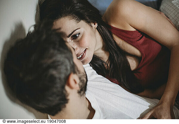 Young romantic couple in bed