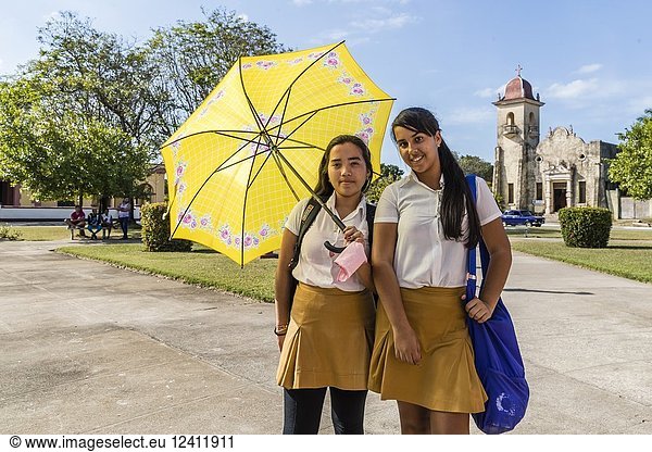 Young school girls in the town square in Nueva Gerona on Isla de la Juventud  Cuba.