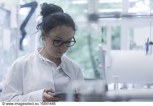 young scientist with tablet in a laboratory