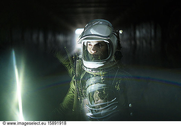 Young spaceman lost in the dark