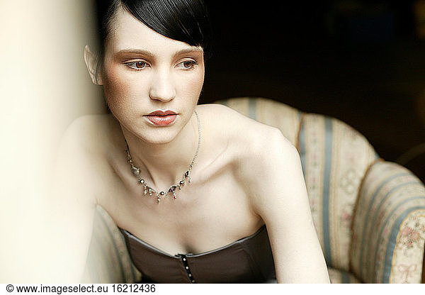 Young woman sitting   portait
