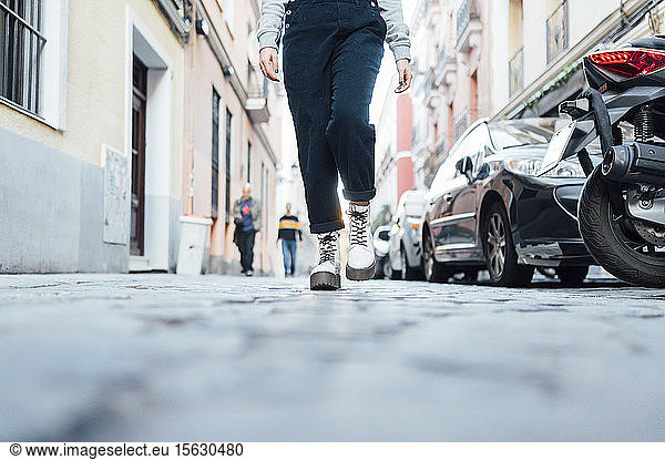 Young woman walking through the city