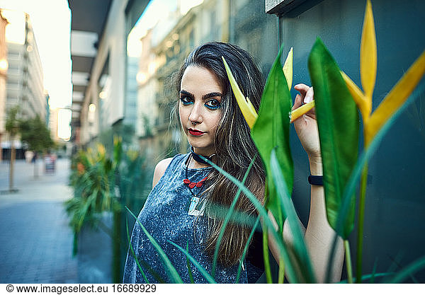 Young woman with urban style posing on the street.