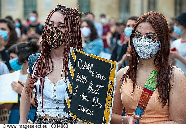 Young women activist with surgical mask at a 'Black Lives Matter' flash mob.