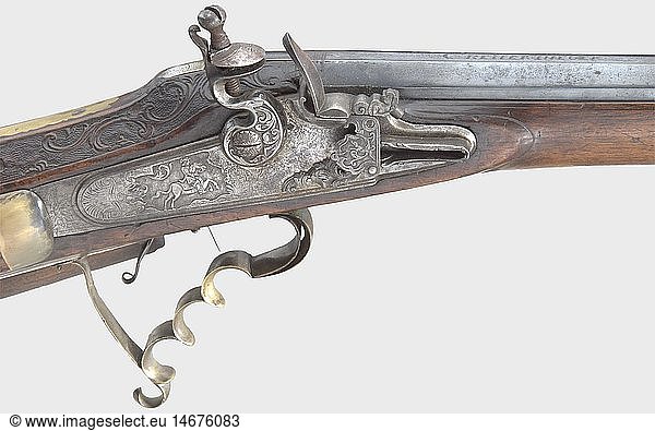 ZIVILE LANGWAFFEN STEINSCHLOSS UND PERKUSSION  SteinschlossbÃ¼chse  C. Keiner  Eger um 1730. Siebenfach gezogener  leicht gestauchter (neu brÃ¼nierter) Achtkantlauf im Kaliber 14 mm mit eingeschobenem Korn und geschnittener Kimme. Ãœber der Kammer (berieben) signiert 'C. KEINER IN EGER'. Hinter der Schwanzschraube silberne Platte mit gravierter FÃ¼rstenkrone und legiertem Monogramm 'AESD'(?). Reliefiert mit Floraldekor und Reiter schÃ¶n geschnittenes Steinschloss in Radschlossform mit Nadelstecher. Floral beschnitzter Nussholzvollschaft mit Nase und Kolbenplatte aus Horn (Schuber ergÃ¤nzt). Glatte Messinggarnitur mit gefingertem (gelÃ¶tetem) AbzugsbÃ¼gel  hÃ¶lzerner Ladestock mit Horndopper. LÃ¤nge 106 cm