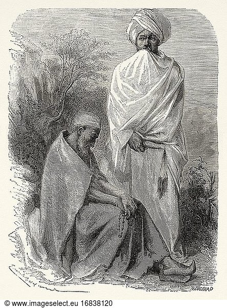 Zwei abessinische Mönche  Äthiopien. Alter Kupferstich aus dem 19. Jahrhundert  Narrative of a Journey through Abyssinia von Guillaume Lejean aus El Mundo en La Mano 1879.