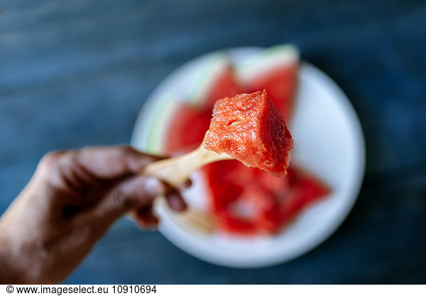 Close up of piece of watermelon on fork
